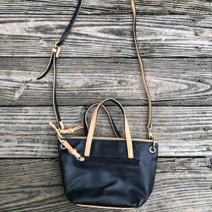 Half black, half tan women’s shoulder purse